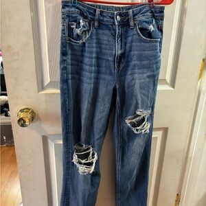 Distressed Blue Denim Jeans
